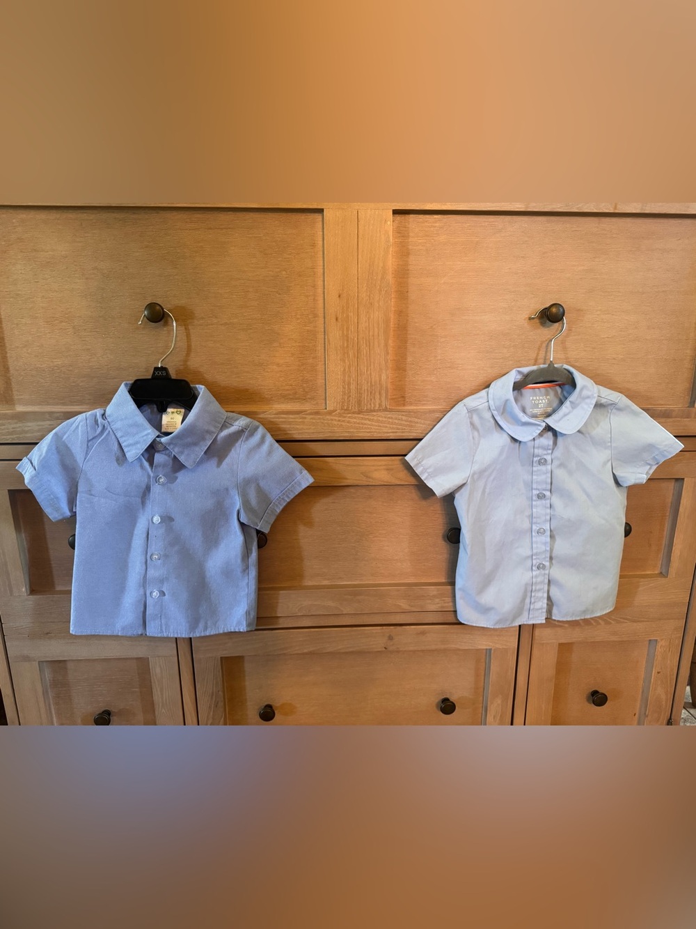 2 Light Blue Kids Short-Sleeve Button-Up Shirts.